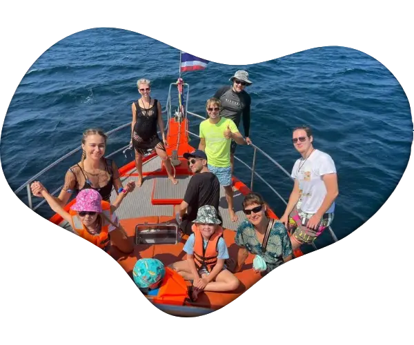 Happy tourists on a group fishing tour in Phuket