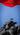 A dynamically composed photograph of the Manas monument against the sky and flag in the center of Bishkek