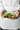 Подача блюда в рамках корпоративного питания, банкета и кейтеринга CRAFT kitchen &amp; drinks: дринаки с зеленью, соусом, яйцом пашот и беконом.