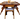 A large wooden table, a lot of wooden chairs at the table. There are several cups on the table.