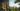 Cozy 3D render of an open balcony area with a panorama of the coastline and forest for a developer