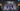 Three game characters wearing VR headsets and holding glowing swords in a virtual reality environment