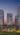 Vertical night 3D render of skyscraper facades in the center of Moscow, resembling a model